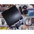 Playstation 3 + Move and 30 Games