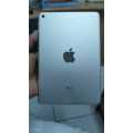 iPad mini 4 128GB Silver wifi only ( cracked Touch) {Pre owned}