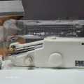 Battery operated hand held sewing machine