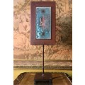 Copper colour metal table lamp with decorative glass panel