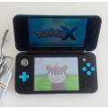`New` Nintendo 2ds xl console with original charger and stylus, memory card included