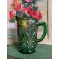 Green carnival glass jug