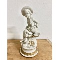 #51 Bisque figurine of girl with lamb