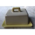 Art Deco ceramic butter dish with yellow base