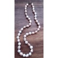 Pink Freshwater Pearl Necklace. New. Knotted. Lenght 43cm.