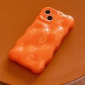 For iPhone 15 Plus Wave Bubbles TPU Phone Case(Pearlescent Orange)