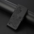 For Xiaomi Redmi Note 13 4G Datura Flower Embossed Flip Leather Phone Case(Black)