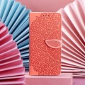 For iPhone 15 Plus Blooming Mandala Embossed Wings Buckle Leather Phone Case(Orange)