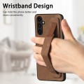 For Samsung Galaxy A04s Retro Wristband Holder Leather Back Phone Case(Brown)