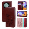 For Honor X9b Rose Embossed Flip PU Leather Phone Case(Brown)