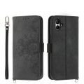 For Samsung Galaxy A05 Skin-feel Flowers Embossed Wallet Leather Phone Case(Black)