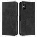 For Sony Xperia 10 VI Skin Feel Heart Embossed Leather Phone Case with Long Lanyard(Black)
