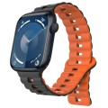 For Apple Watch Series 9 41mm Reverse Buckle Two Color Magnetic Silicone Watch Band(Black+Orange)