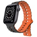 For Apple Watch Series 6 44mm Reverse Buckle Two Color Magnetic Silicone Watch Band(Black+Orange)