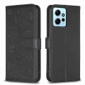 For Xiaomi Redmi Note 12 4G Global Four-leaf Embossed Leather Phone Case(Black)