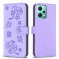 For Xiaomi Redmi Note 12 5G Global Four-leaf Embossed Leather Phone Case(Purple)