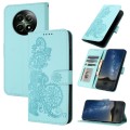 For Realme 12 5G Global Datura Flower Embossed Flip Leather Phone Case(Light blue)