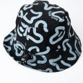 Bucket Hat Black and White Popcorn with elastic to tighten.
