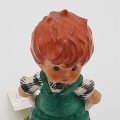 "W. Goebel" Boy in Green Dangureen Pulling Out His Pockets Hummel Figurine