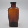Brown Pharmaceutical Bottle with Black Bakelite Lid