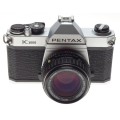 K1000 PENTAX chrome SLR 35mm vintage film camera with SMC-Pentax-M 1:1.4 f=50mm Fast lens - Pentax