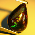 1.21ct Natural Ethiopian Black Opal Pear Cab