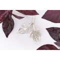 Pierced leaves pendant