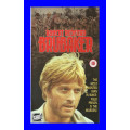 VHS CASSETTE  -  BRUBAKER (ROBERT REDFORD)