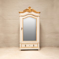 Antique gilded Armoire
