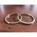 Gold And Silver Plated Hoop Earrings #ML227 R120.00 | Dimensions: Diameter is 40mm