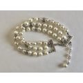 Bracelet With Silver Tone Clasp - 3 strands With Pearly Beads and Diamante circles #ML505| Dimens...