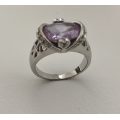 Silver plated Ring, Oval Purple Stone in lace design setting hearts on either side #ML576 R495.00...