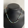 Necklace - String of Blue Fresh Water Pearls (seed pink, blue, red, black, green and white colour...