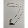 Necklace - 925 Silver Fawn Shaped Pendant on Chain. The pendant has silver bobbles and green ston...