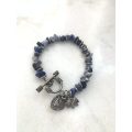 Bracelet With Irregular Shaped Blue Stones Split By Silver Coloured Round Beads With Pretty Clasp...