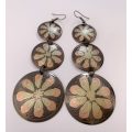 Earrings - Metal With 3 Dangling Circles in Differing Sizes. Flower Pattern Inside Each Circle #M...
