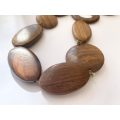 Necklace - Wooden Oval And Round Beaded Necklace With One Ring Bead On Green Cord #ML1497
