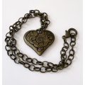 ML1600NecklaceNecklace - Rustic Metal Patterned Heart Pendant on Rustic Metal Chain250.00Rus...