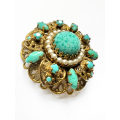 Brooch - Vintage Filigree Turquoise Design with small stones and large stone in the middle surrou...