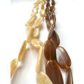 Necklace - Retro Plastic Beaded Design. One Cream Oval Shaped Beads. One Brown Oval Shaped Beads ...