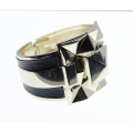 Bangle - Vintage Gold Tone Square in Middle of Triangle Pattern. Black Leather Type Bands - ML2315