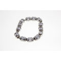 Bracelet - Fashion Barrel Style Silver Tone Bracelet with Crystal Beads with Parve Design - ML2363