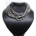 Necklace - Silver Tone & Different colour metal chains. Middle Chain has silver beads on it - ML2583