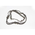 Necklace - Fashion Silver Tone Rope Design. Crosses holding the double Chains together. - ML2591