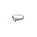 Ring - Silver Tone Band. Solitaire Style Centre Stone surrounded by small Diamantes - ML2972