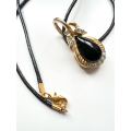 Necklace - Vintage Gold Tone Pendant. Pear Shaped Black Stone in Gold Tone Frame with Diamantes o...