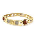 pX Raksha Bandhan Golden Om Rakhee Imitation Gold-Diamante Bracelet