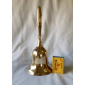 Brass bell with brass handle 22cms tall
