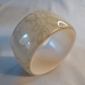 Vintage lucite plastic lace embedded cased clear and white bracelet
