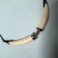 Stirling silver chain with ivory coloured tusk shaped items